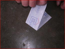 Strength testing with cross-hatch test on concrete floors